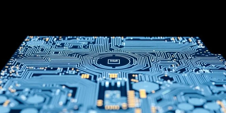 Close-up of advanced semiconductor wafers with intricate circuitry.