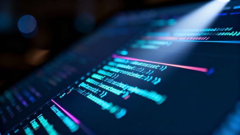 Digital screen with glowing code patterns