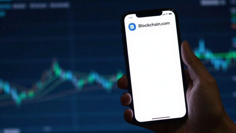 Blockchain.com app on a smartphone for trading.