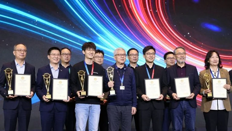 Tech innovators celebrating at an awards ceremony.