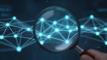 Magnifying glass over blockchain network