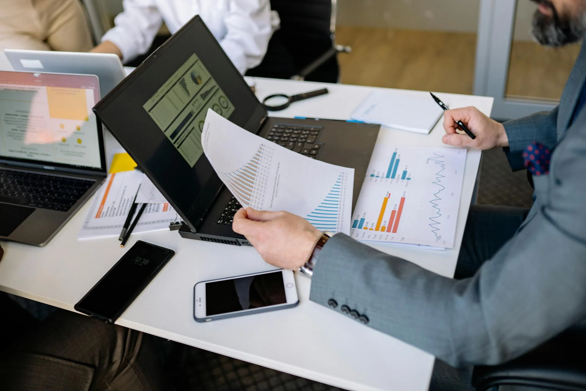 A tech professional reviewing cross-border financial planning documents