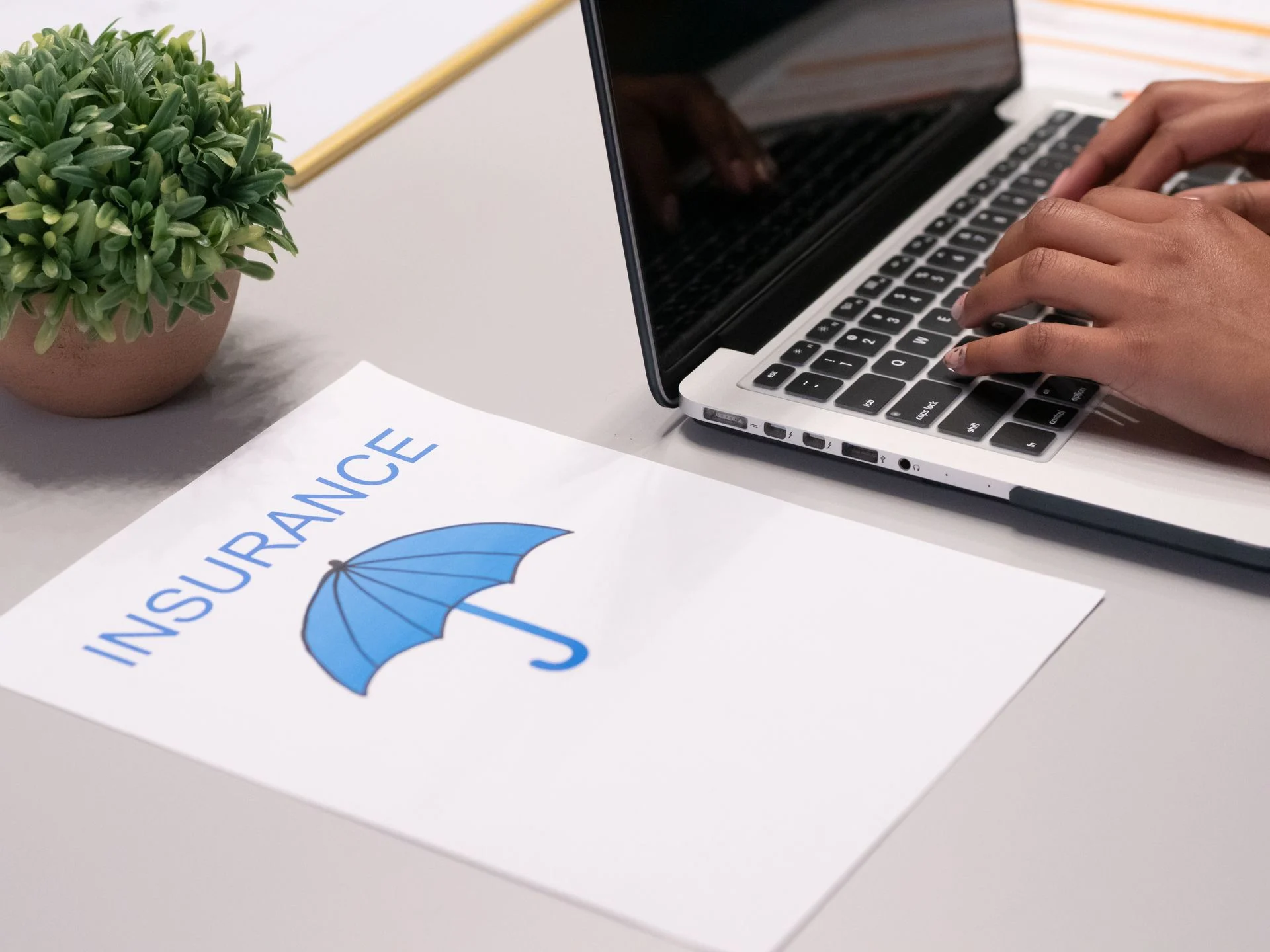 A driver comparing car insurance quotes online