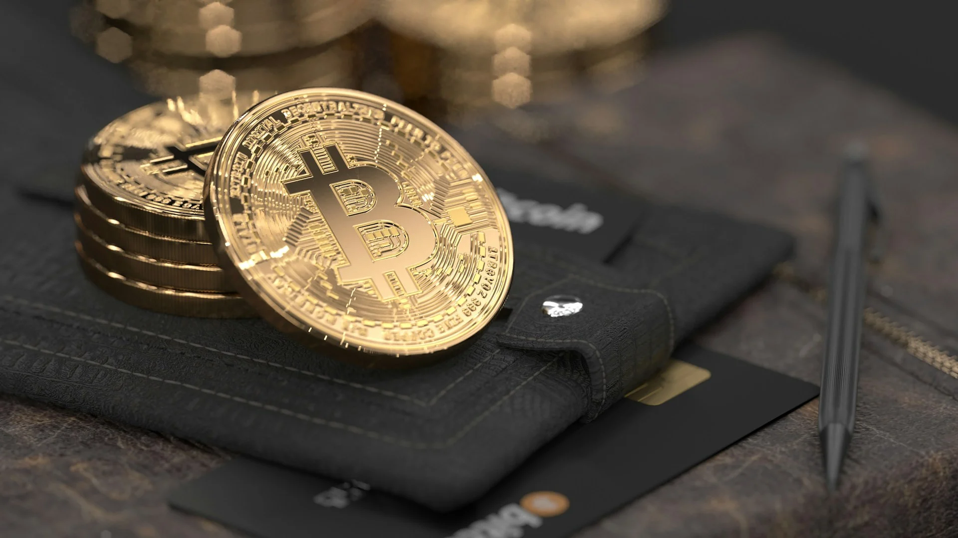 Bitcoin on a leather wallet and a payment card